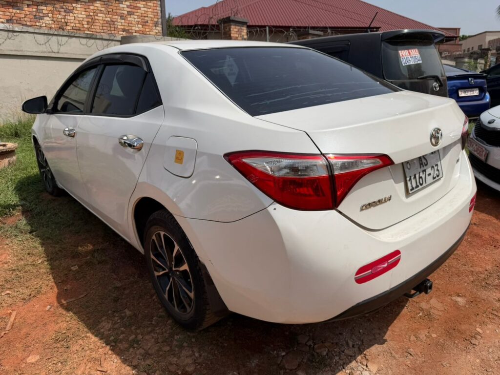 Toyota Corolla (White)